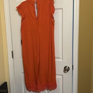 Pretty new burnt orange dress. Never worn.